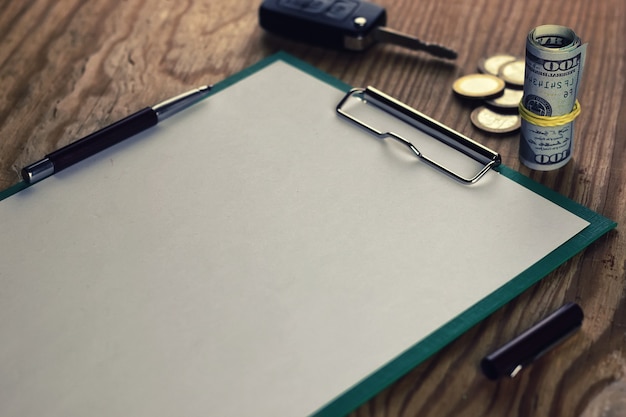 A close-up of official documents related to student loans, highlighting key sections about eligibility requirements and application deadlines, with a pen resting on top, symbolizing the importance of careful review and action.