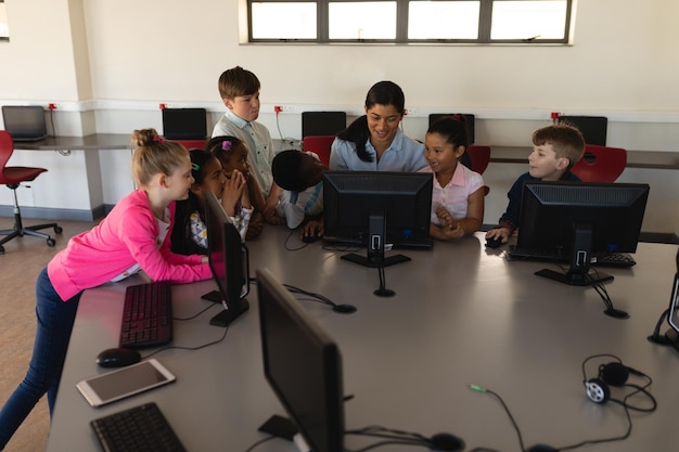 A well-equipped computer lab in a public school, where students are using technology for research and learning, demonstrating the resources available in some public schools.