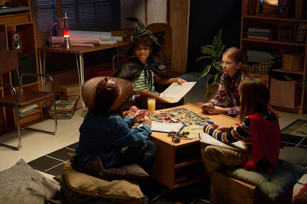 A group of diverse children sitting around a table in a classroom, focused on a science experiment led by their teacher, showing curiosity and collaborative learning.
