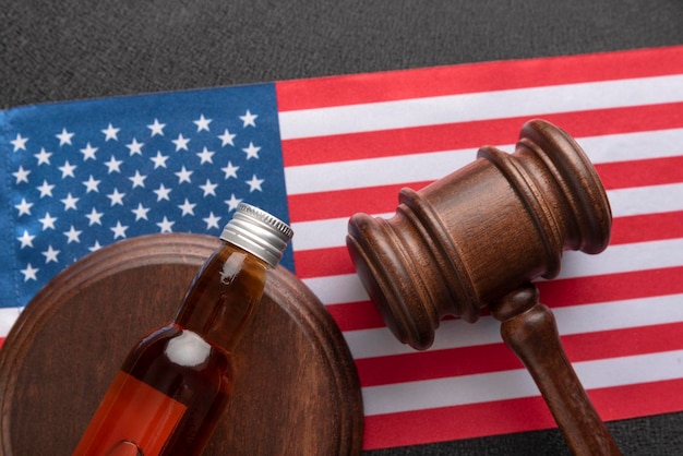 A gavel resting on a copy of the United States Constitution. This image symbolizes the legal challenges and Supreme Court decisions affecting the student loan forgiveness initiatives.