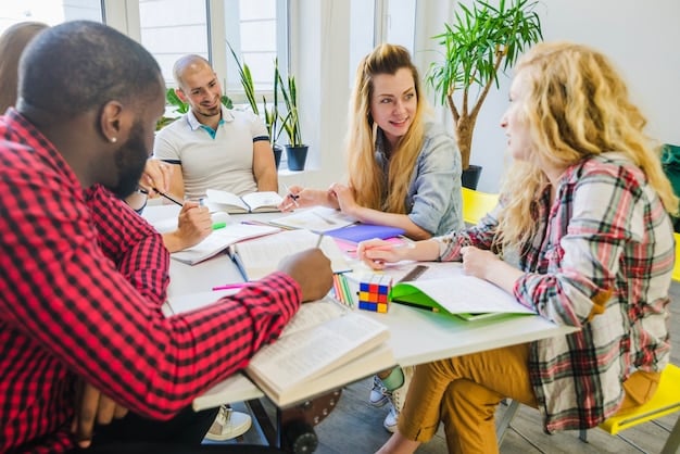 A group of educators in a conference room reviewing grant application materials. They are discussing strategies and highlighting key points in the documents, with laptops and notebooks scattered around the table. The atmosphere is collaborative and focused.