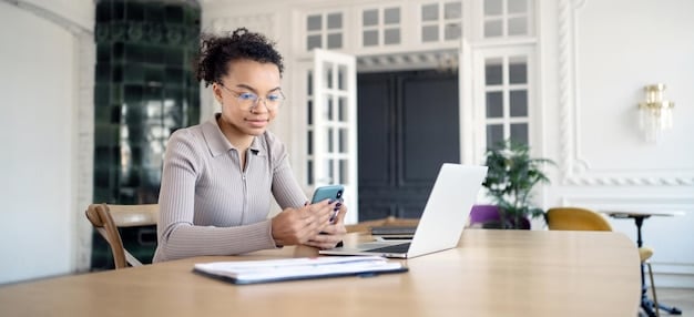 A person confidently completing an online unemployment benefits application on a laptop, with a neatly organized workspace in the background.