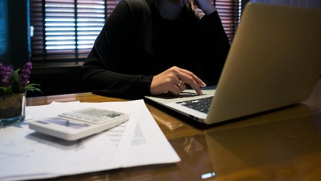 A person working at a computer, focused on tax preparation software, with a close-up of the Earned Income Tax Credit (EITC) section highlighted on the screen.