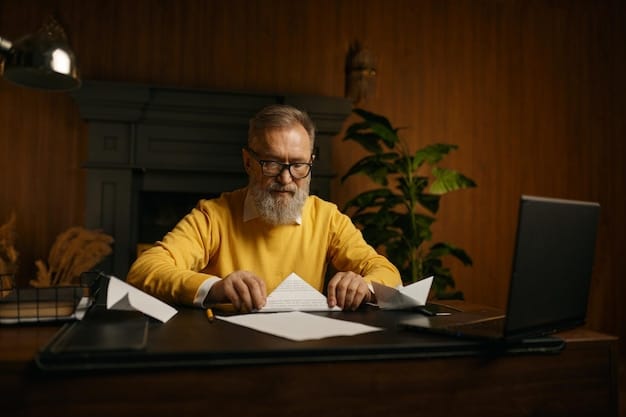 A person sitting at a desk reviewing financial documents under a focused light, symbolizing careful retirement planning.