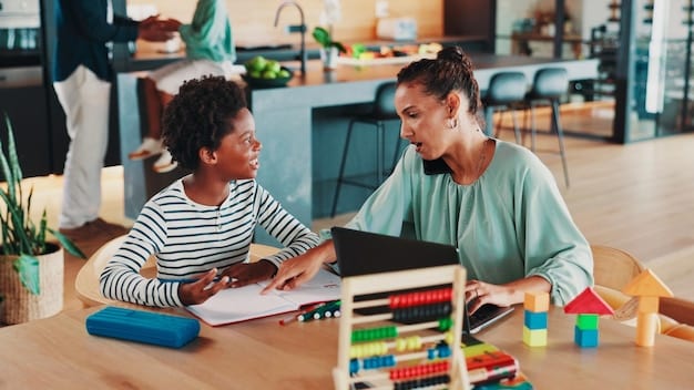 A parent and a special education teacher sitting at a table in a school setting, reviewing an Individualized Education Program (IEP) document together and discussing the child's progress.