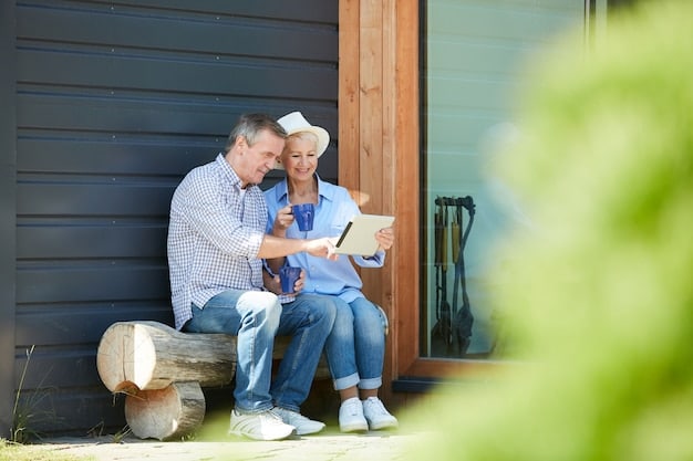 A middle-aged couple smiling and discussing retirement plans while sitting on their porch, with a laptop displaying investment charts nearby. The atmosphere is relaxed and hopeful, symbolizing the benefits of planning for the future.