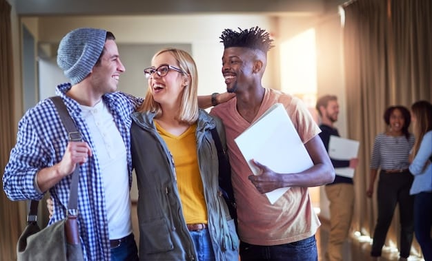 A diverse group of students celebrating on a college campus, symbolizing access to education through financial aid.